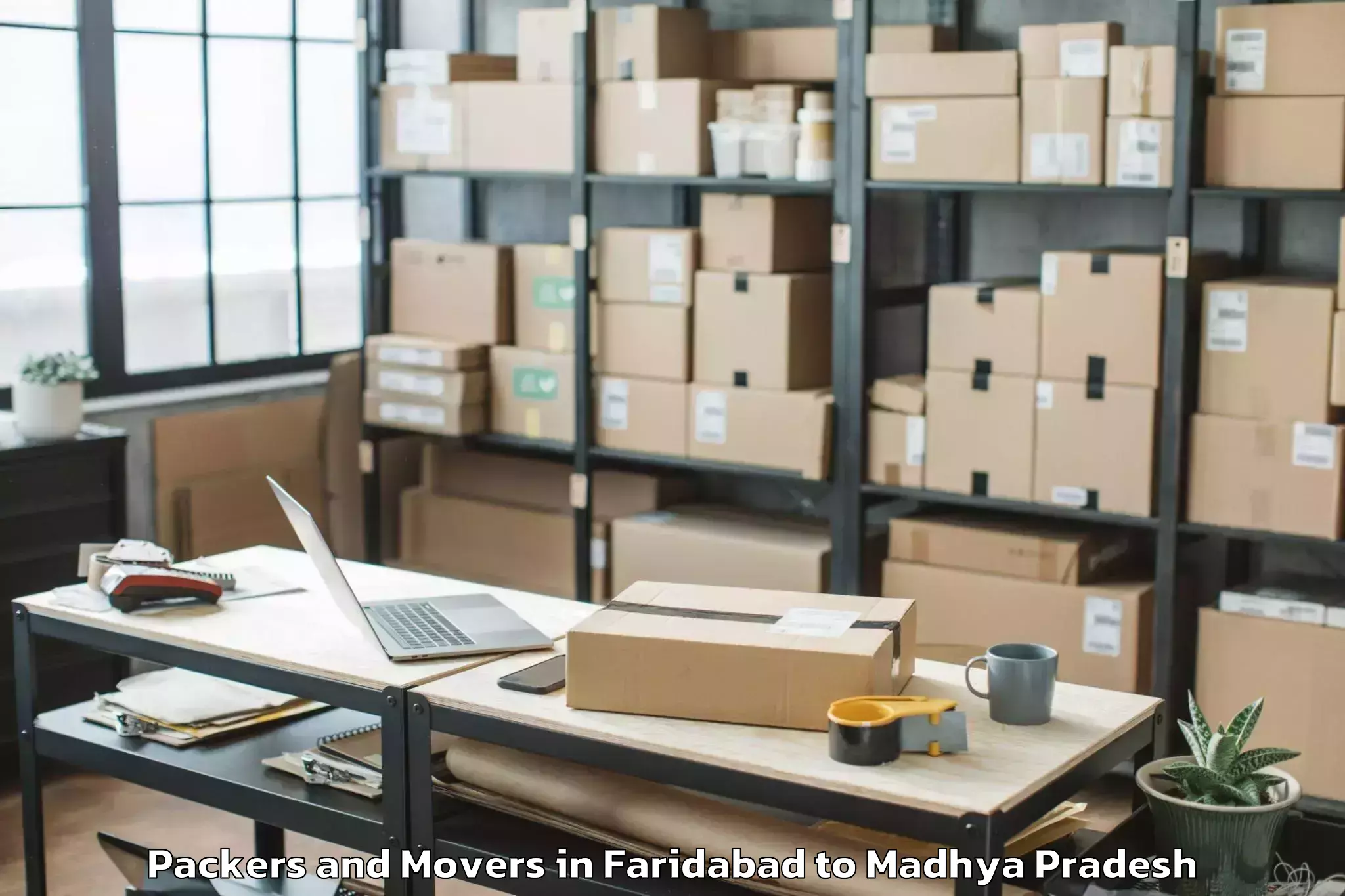 Book Faridabad to Khachrod Packers And Movers Online